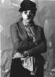 Linda Brokenshire dressed in clown costume (b&w photo)